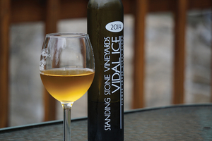 Vidal Blanc, a dessert ice wine, has hints of apricot and honey. The sweetness is made palpable by a balancing sour. The wine comes from Standing Stone Vineyards in Hector, New York